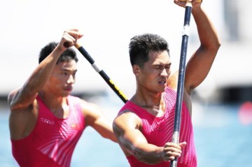 开云app-郑鹏飞因爱坚持 中国皮划艇13年后重登奥运领奖台